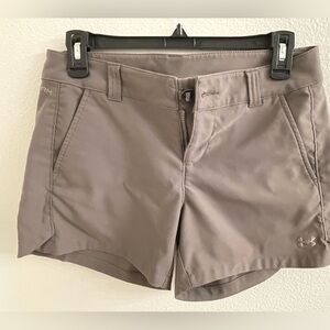 Under Armour shorts.  Excellent condition. “Storm” fitted golf shorts.  Size 4.